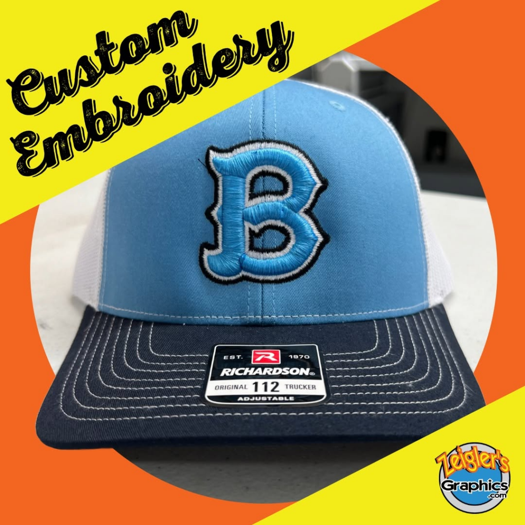 Blue and white cap featuring raised blue B embroidery