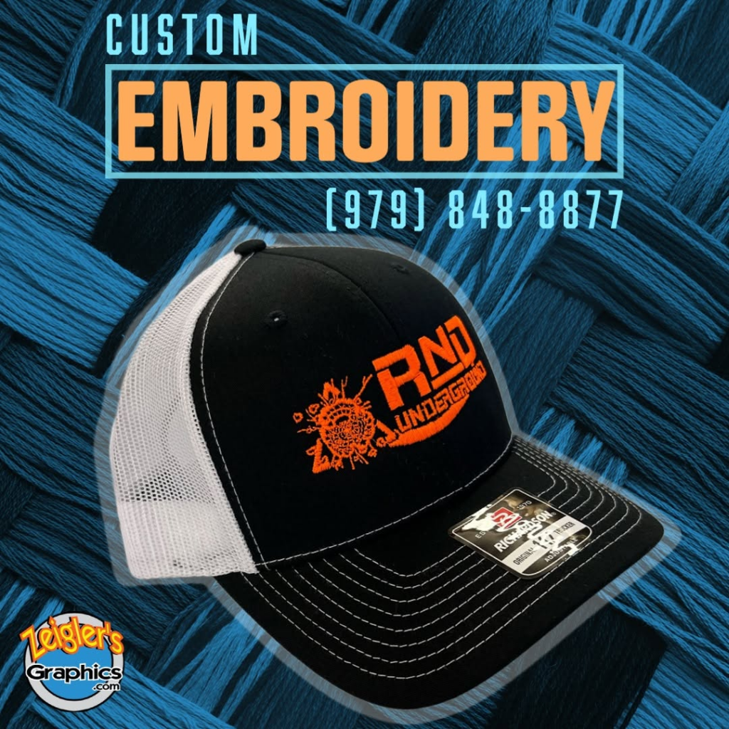 Black and white cap with orange RND embroidered logo
