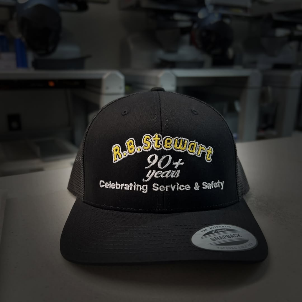 Black cap with R.B. Stewart 90-plus years embroidered anniversary design